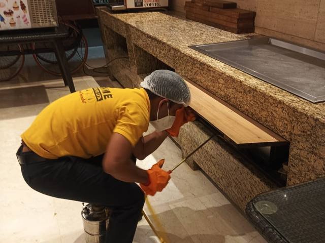Treating fixed furniture in a hotel lobby